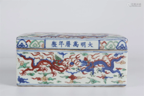 A COLORED BLUE-AND-WHITE PORCELAIN LIDDED BOX.