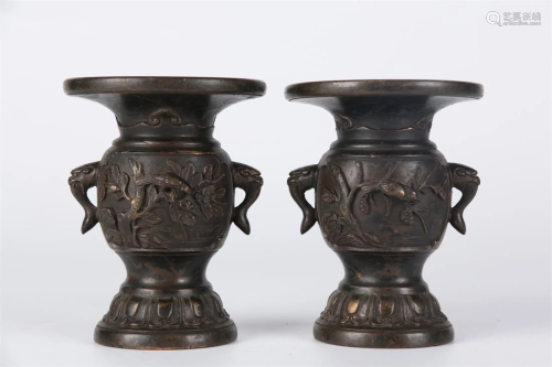 A PAIR OF Bronze BOTTLES, WITH FLOWERS DESIGN.