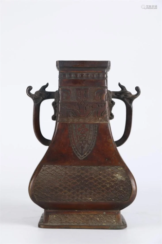 A SQUARE Bronze BOTTLE WITH DRAGON-SHAPED EARS.