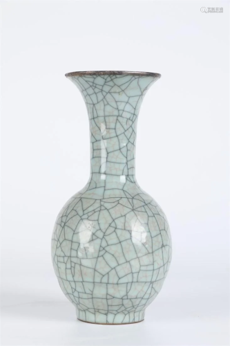 A LONG-NECK PORCELAIN BOTTLE WITH SILVER RIM.