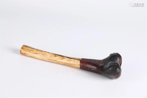 A BONE TOBACCO PIPE.