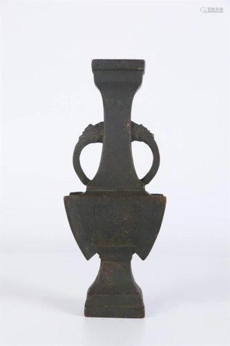 A Bronze BOTTLE WITH DRAGON-SHAPED EARS.