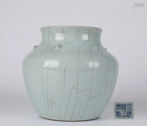 A PORCELAIN JAR WITH DRUM NAILS DESIGN.