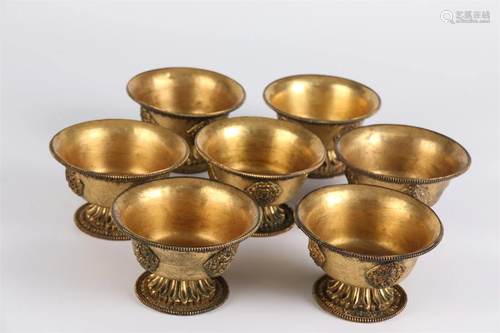 A SET OF TIBETAN GILT Bronze OFFERING BOWLS.