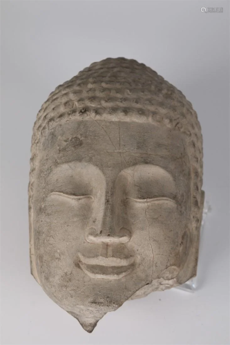 A BLUESTONE SAKYAMUNI BUDDHA'S HEAD STATUE.