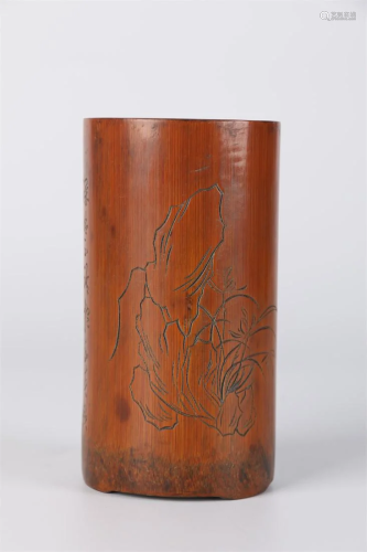A BAMBOO BRUSH POT WITH CARVED POEM DESIGN.
