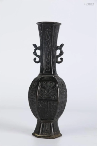 A Bronze DISPLAY BOTTLE WITH FLOWERS DESIGN.