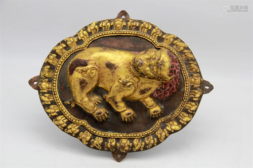 Antique Gilt Copper RepoussÃ© Panel of a Snow Lion