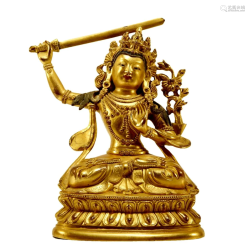 A Gilt-Bronze Figure Of Manjusri