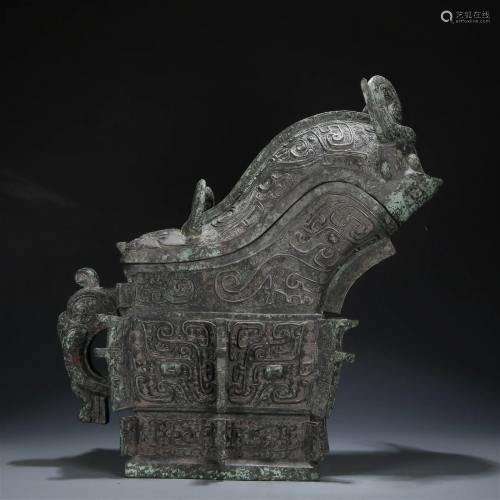 A Bronze 'Animal Mask' Ewer And Cover With Inscrip...