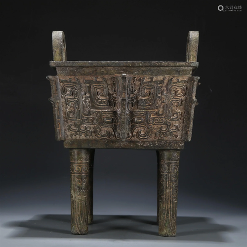 A Bronze 'Animal Mask' Ritual Food Vessel, Ding , ...