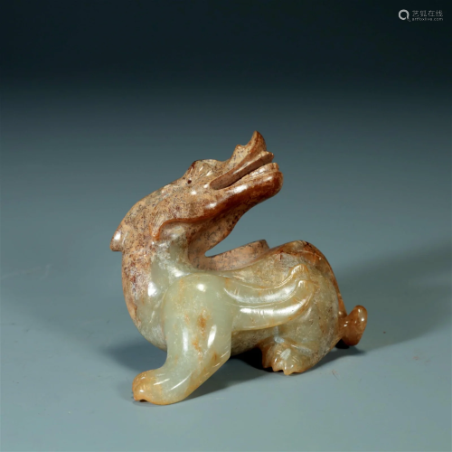 A Gaogu White Jade Unicorn