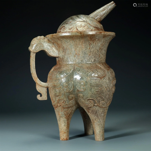 A Gaogu Celadon Jade 'Animal Mask' Tripod Ewer