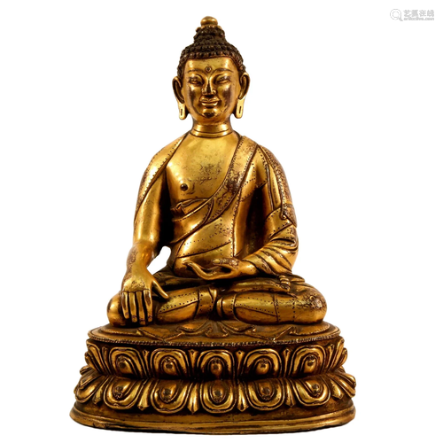 A Gilt Bronze Figure Of Buddha