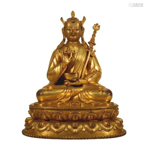 A Gilt-Bronze Figure Of Padmasambhava