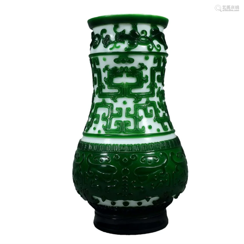 A Green Overlay White Glass 'Animal Mask' Vase