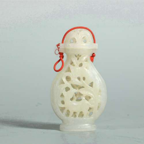 Jade hollow carved snuff bottle