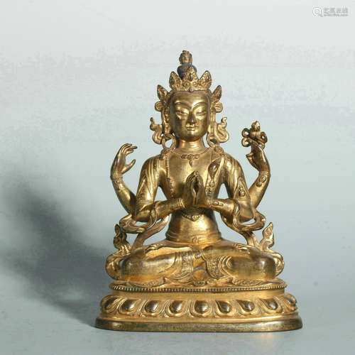 Gilt bronze statue of Guanyin with four arms