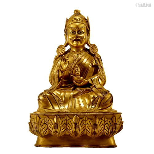 A Gilt-Bronze Figure Of Padmasambhava