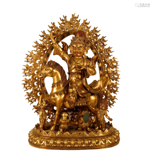 A Gilt-Bronze Figure Of Jambhala Seated On A Horse