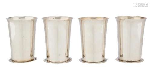 A SET OF FOUR LARGE STERLING SILVER BEAKERS Asprey & Co....