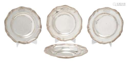 A SET OF THREE GEORGE III STERLING SILVER SOUP PLATES, AND A...