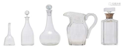 AN IRISH CUT CRYSTAL CRYSTAL JUG TOGETHER WITH THREE DECANTE...