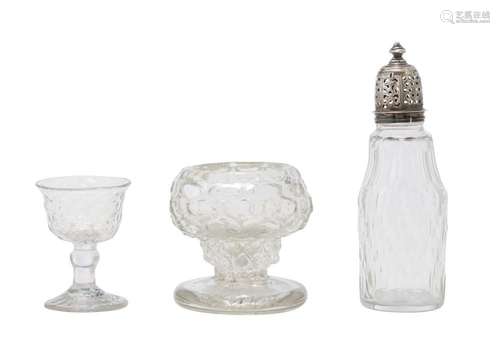 A MOULDED GLASS SALT CELLAR, A HONEYCOMB MOULDED EGG CUP AND...