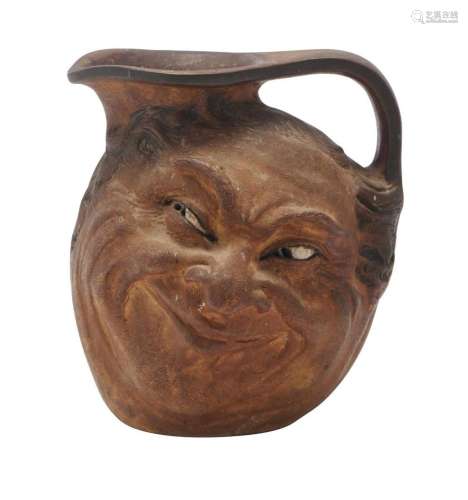 A MARTIN BROTHERS TWO-FACE JUG Modelled by Robert Wallace Ma...