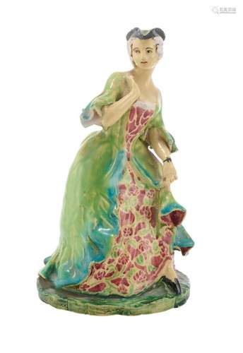 AN AUSTRALIAN EARTHENWARE FIGURE OF A LADY By Marguerite Mah...