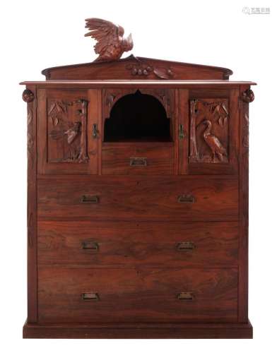 A CARVED AUSTRALIAN BLACKWOOD CHEST OF DRAWERS BY ROBERT PRE...