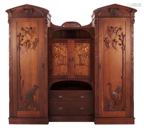 A CARVED AUSTRALIAN BLACKWOOD WARDROBE BY ROBERT PRENZEL Cir...