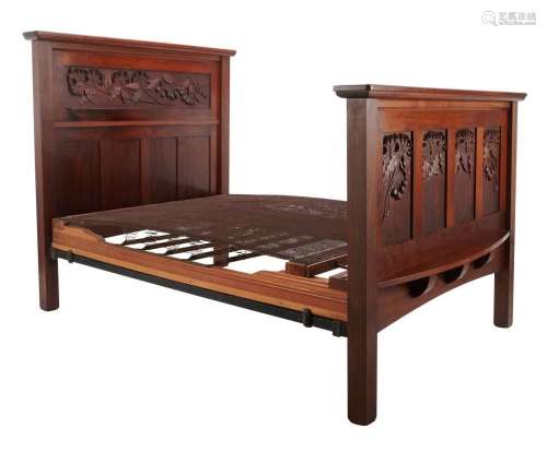 A CARVED BLACKWOOD DOUBLE BED BY ROBERT PRENZEL Circa 1908