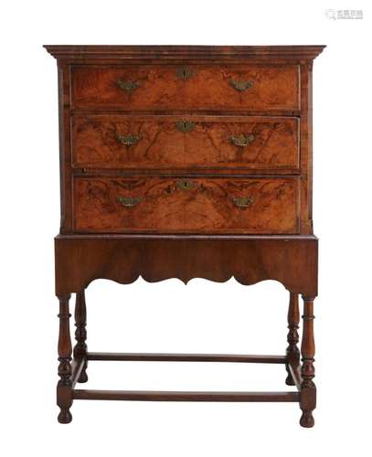 A GEORGE I FIGURED WALNUT CHEST ON STAND The chest circa 173...