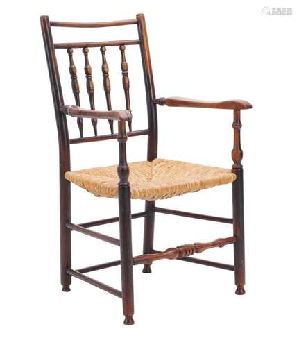 AN ENGLISH ELM ELBOW CHAIR First half 19th century