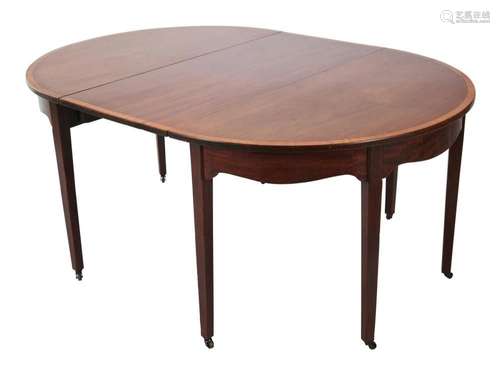 A GEORGE III MAHOGANY EXTENDING DINING TABLE Circa 1800