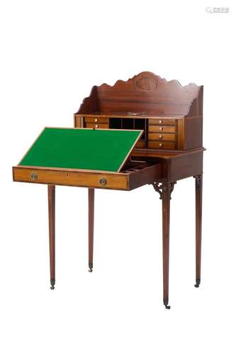 A GEORGE III MAHOGANY AND SATINWOOD WRITING TABLE Circa 1790