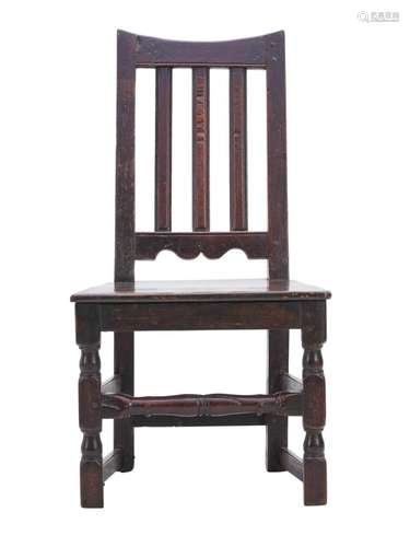 AN ENGLISH OAK LATH-BACK SIDE CHAIR Early 18th century