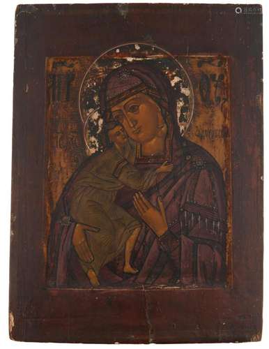 A RUSSIAN PAINTED WOOD ICON Early 19th century