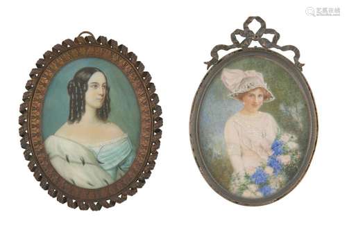 TWO PORTRAIT MINIATURES IN DECORATIVE BRASS FRAMES