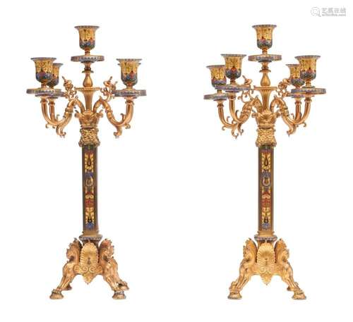 A PAIR OF FRENCH GILT BRONZE AND CHAMPLEVE ENAMEL CANDELABRA...