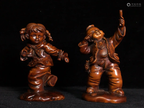Two Chinese Boxwood Wood Urchin Statues