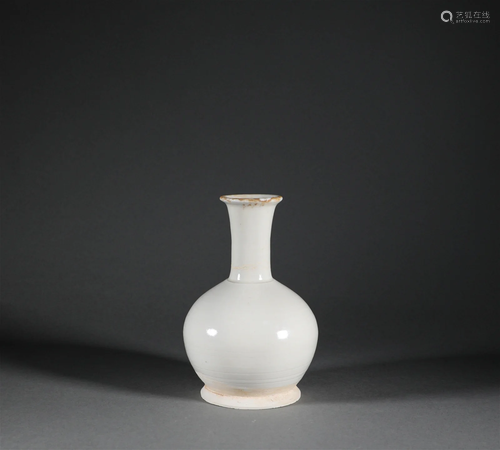 White glazed long neck bottle