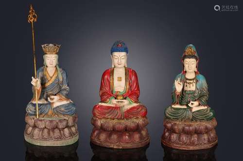 A SET OF ORIENTAL POLYCHROME WOODEN DEITIES