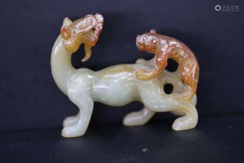 HAN, RUSSET JADE CARVING OF CHI-TIGER