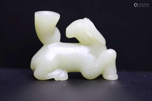 QING, WHITE JADE CARVING OF A RECUMBENT HORSE