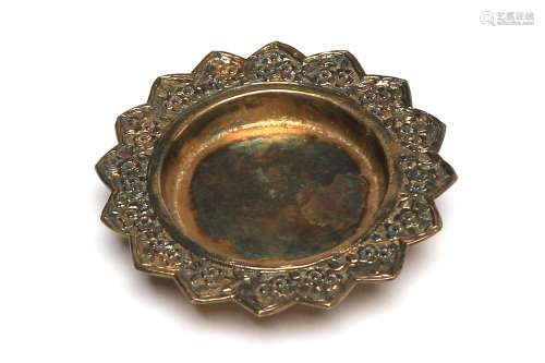 A carved and repousse' silver miniature tray decorated ...