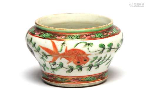 A small polychrome porcelain spittoon painted with goldfish ...