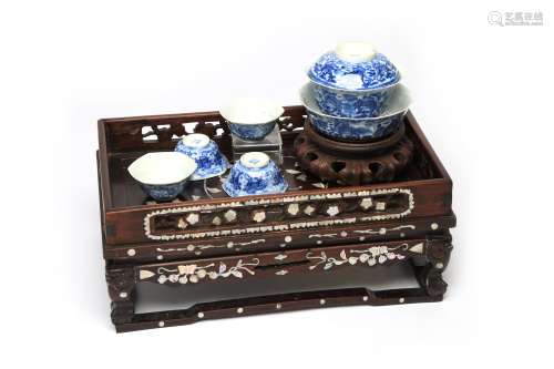 A blue and white porcelain tea set painted with Qi-lins amon...