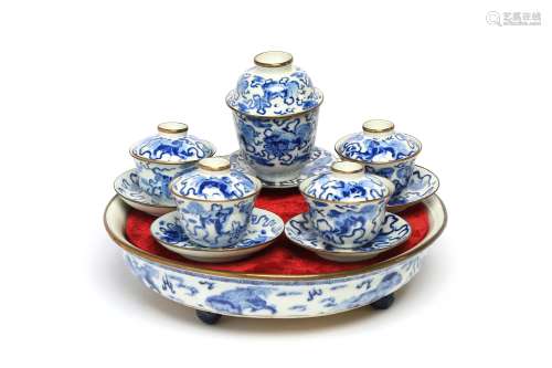 A blue and white porcelain tea set painted with painted with...